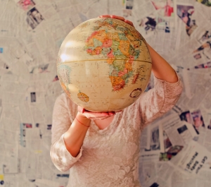 Woman holding a globe