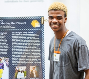 Student with his research project